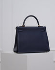 Hermès Kelly 32 Retourne aus Togo Leder