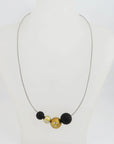 Niessing Schnur mit Kugeln und Brillant in 950`er Platin/18K Gold ca. 43,0 cm