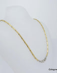 Collier im Verlauf mit ca. 0,26ct W-si Brillant in 750/18K Weiß-/Gelbgold