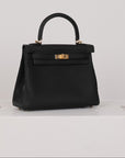 Hermès Kelly 25 aus Togo Leder mit Gelbgoldenen Beschlägen in Noir