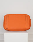Hermès HAC 40 Retourne aus Clemence Leder mit gelbgoldenen gebürsteten Beschlägen in Orange