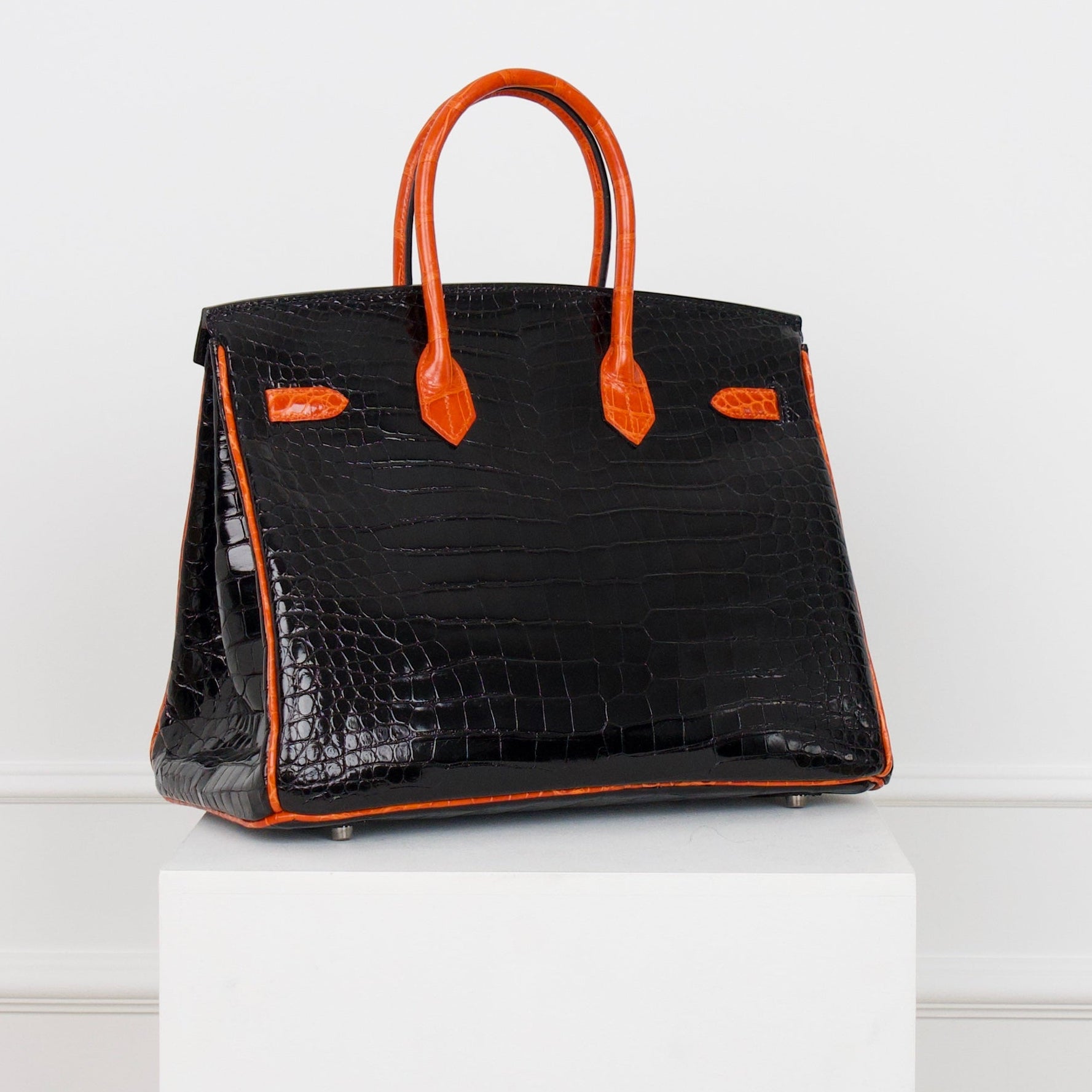 Hermès Birkin Limited Edition aus Alligator Leder mit Palladium Beschlägen in Noir/Orange