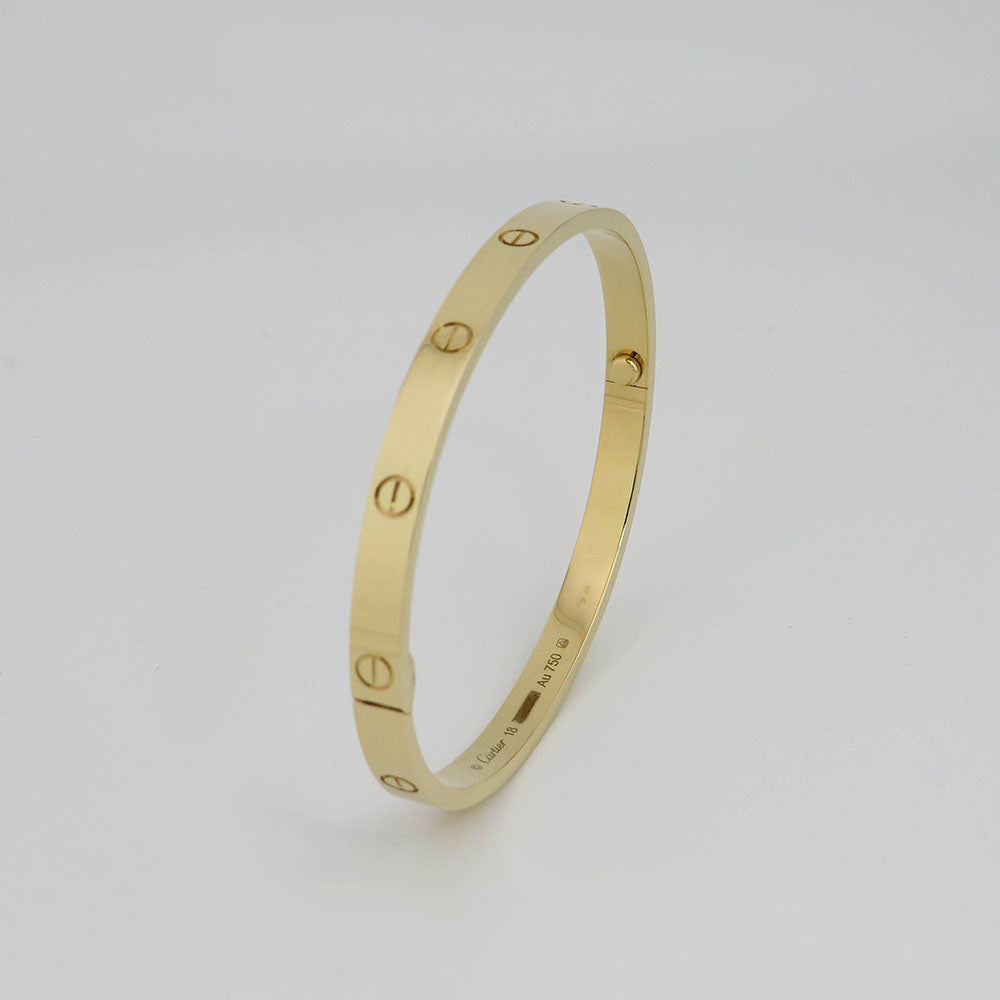 Cartier Love Armreif mittleres Modell in 750/18K Gelbgold Gr. 18 mit Box