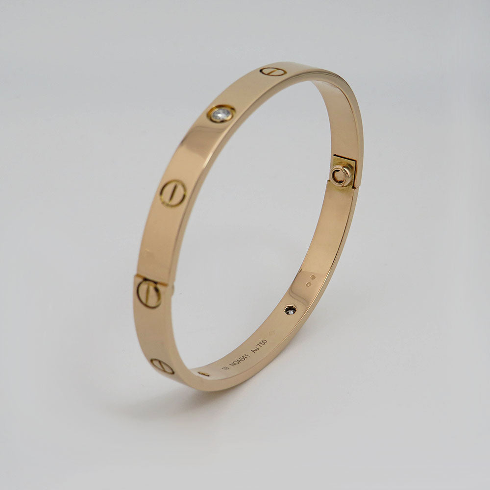 Cartier Love Armreif klassisches Modell mit 4 Diamanten 750/18K Rosegold Gr. 18