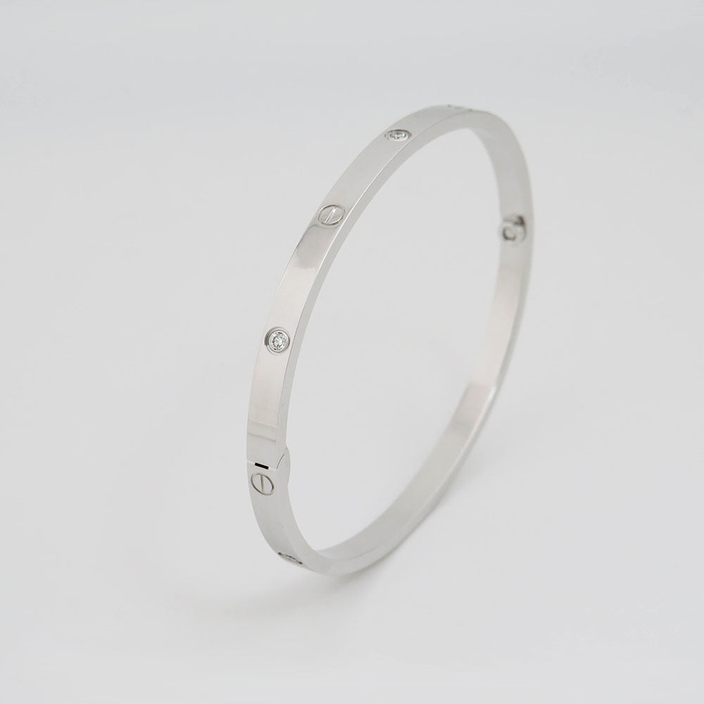 Cartier Love Armreif kleines Modell mit 6 Diamanten 750/18K Weißgold Gr. 17
