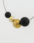 Niessing Schnur mit Kugeln und Brillant in 950`er Platin/18K Gold ca. 43,0 cm