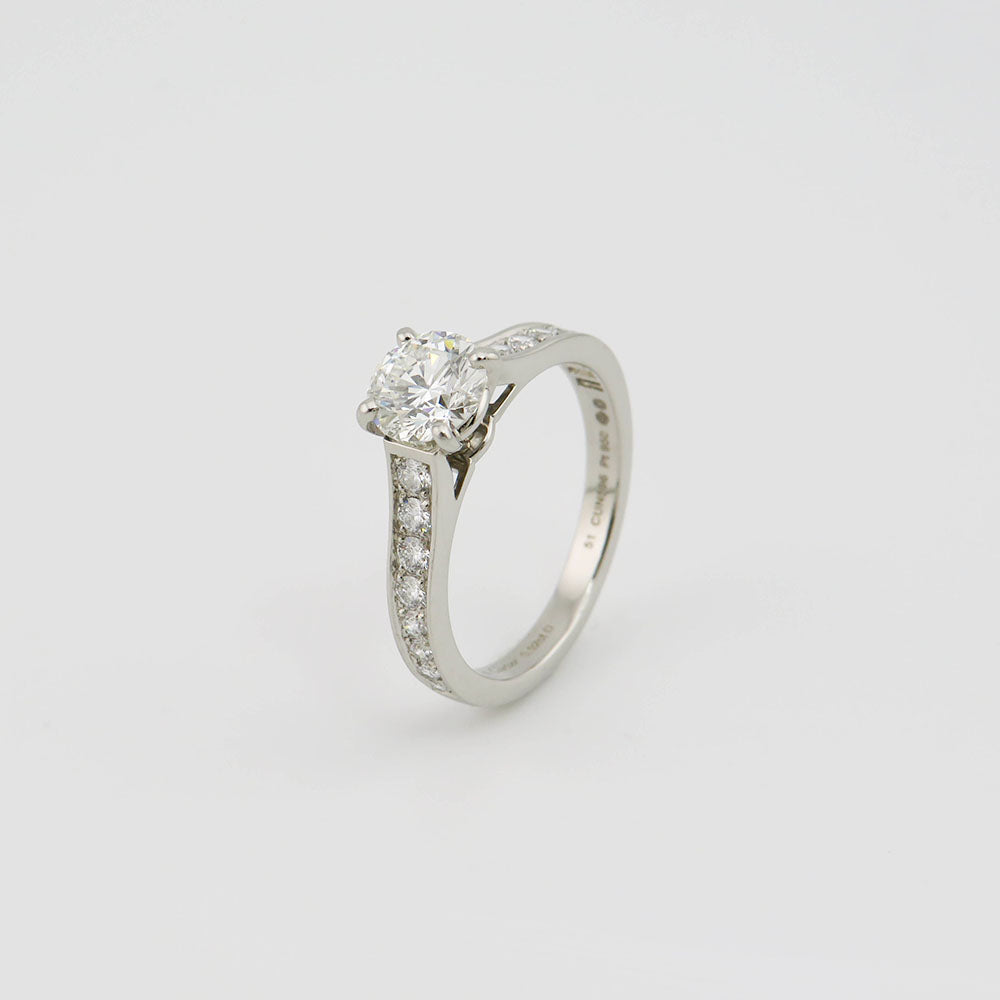 Cartier Solitärring mit 0,92ct H-vvs 2 + ca. 0,30ct Brillant in 950`er Platin